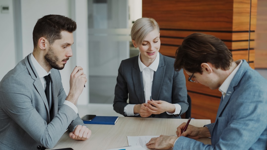 Female civil engineer discusses flood risk management plans with colleague
